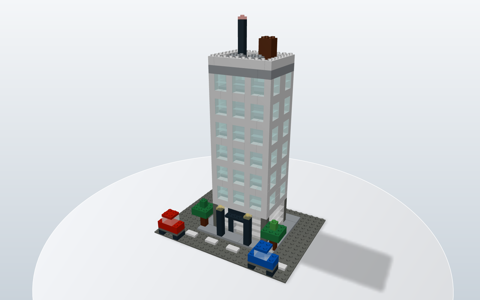 Lego apartment building on a street